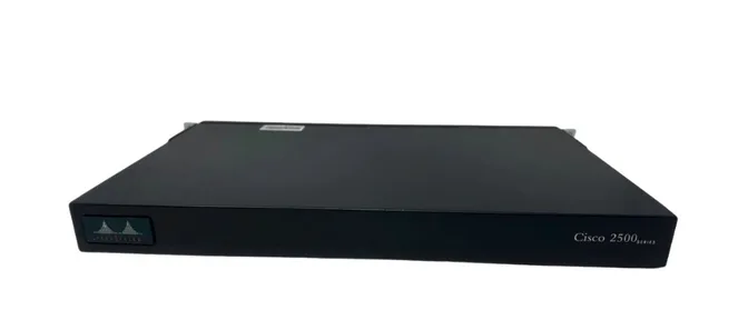Cisco 2500 series router — dark 1U rack-mount unit with front status LEDs